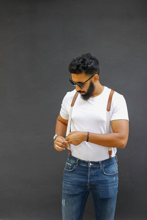 Suspenders and a tshirt go very well together. A white t-shirt matches dark suspenders, a black t-shirt suits white suspenders or braces very well in Europe fashion.